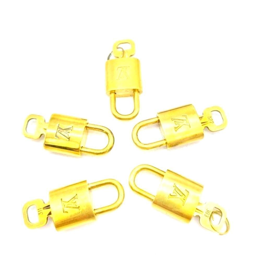 One Louis Vuitton Lock & Key - Picture 6 of 7